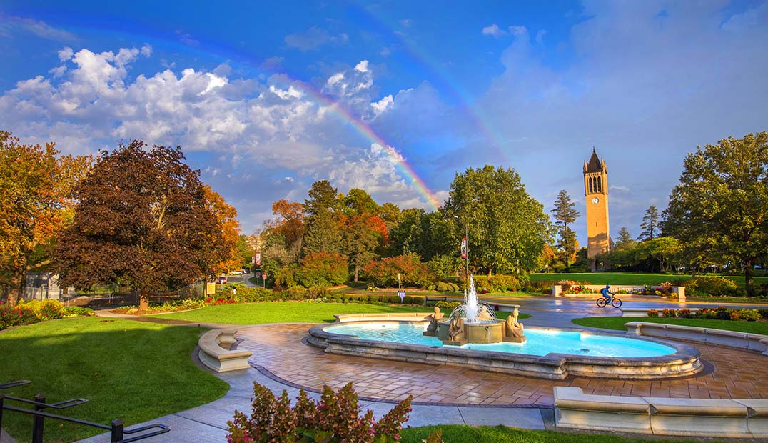 Sunny view of a rainbow over central campus.