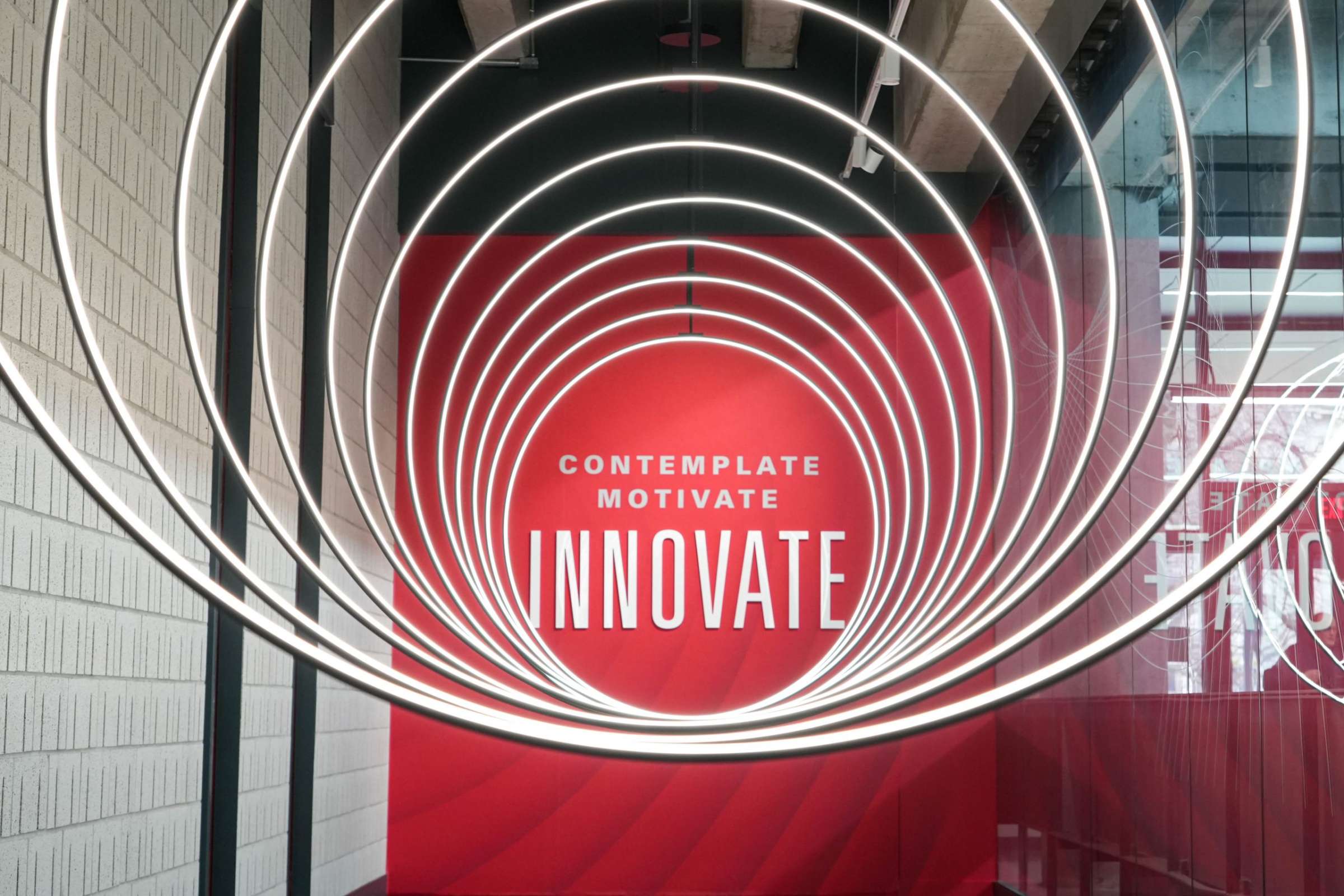 Art installation at the Student Innovation Center with lettering that reads Contemplate, Motivate, Innovate.